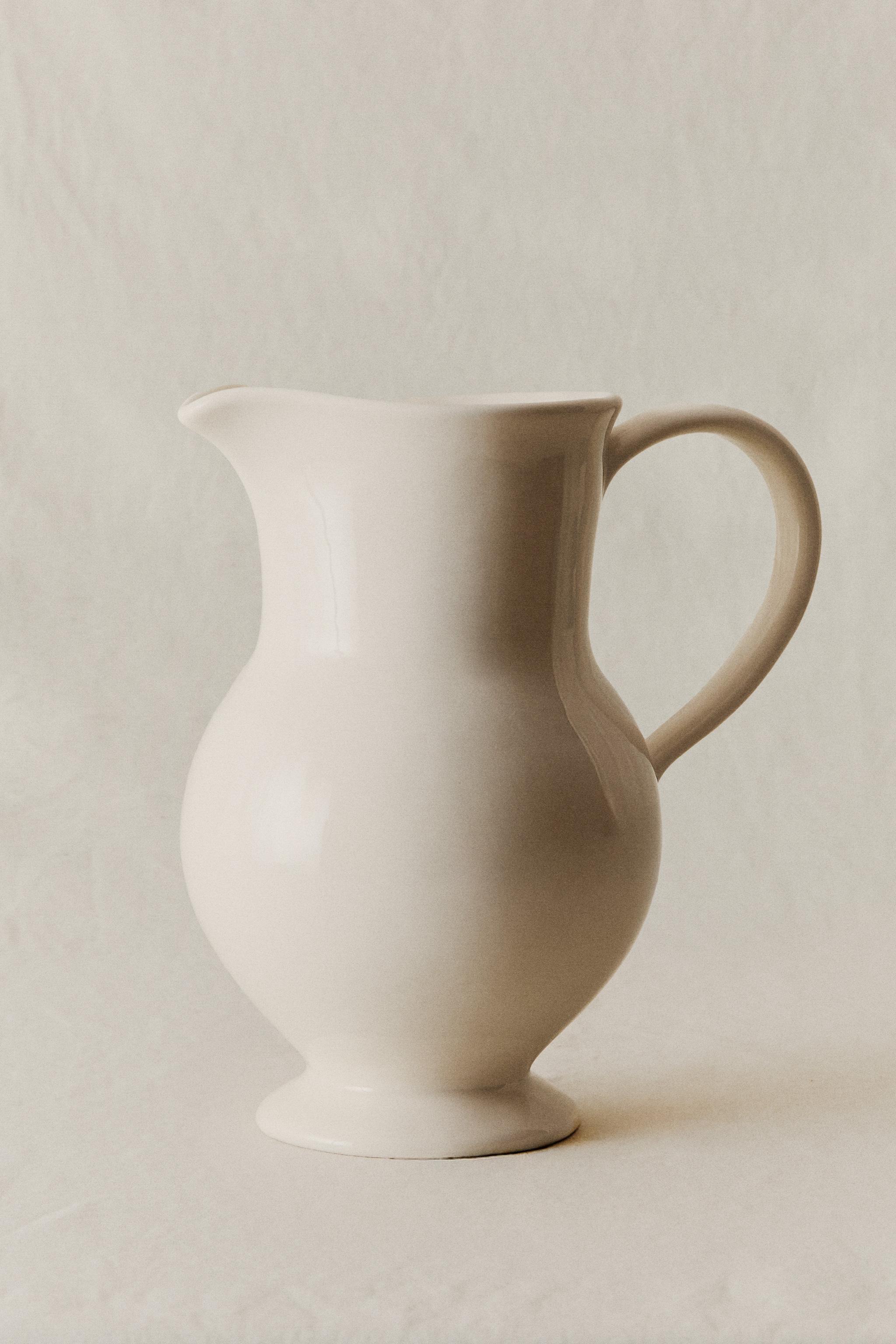 CREAM DECORATIVE CERAMIC PITCHER